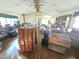 Spacious living room with hardwood floors, a high ceiling, and generous natural light at 512 Monroe Holt Rd, Graham, NC 27253