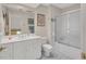 Bathroom boasts a white vanity with ample counter space and a tub-shower combo for convenience at 515 Swim & Croquet, Pittsboro, NC 27312