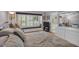 Serene bedroom featuring a window seat with shuttered window and natural light at 515 Swim & Croquet, Pittsboro, NC 27312