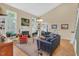 Spacious living room with fireplace, high ceilings, and plenty of natural light at 515 Swim & Croquet, Pittsboro, NC 27312