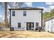 Spacious backyard with outdoor seating, a grill, and ample space for entertaining at 609 Rawls Dr, Raleigh, NC 27610