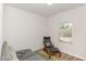 Guest bedroom featuring a couch, chair and a window with natural sunlight at 609 Rawls Dr, Raleigh, NC 27610