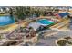 Overhead view of a community pool, playground, lake and recreation buildings at 6205 Taylor Rd, Wendell, NC 27591