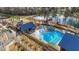 Overhead view of a pool, clubhouse, splashpad, playground and lake in the community at 6205 Taylor Rd, Wendell, NC 27591