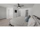 Comfortable bedroom featuring carpet, neutral walls, ceiling fan, and white trim at 6205 Taylor Rd, Wendell, NC 27591