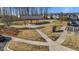 Inviting community park featuring a picnic shelter, walking paths, and green space, perfect for outdoor activities at 6205 Taylor Rd, Wendell, NC 27591