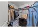Walk-in closet offering ample shelving and hanging storage with dresser for organized storage at 6205 Taylor Rd, Wendell, NC 27591