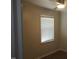 This bedroom features hardwood floors and a window with blinds, creating a calming atmosphere at 6600 Coach Light Cir, Raleigh, NC 27613