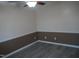 Dining room with chair rail molding, neutral paint, and a ceiling fan at 6600 Coach Light Cir, Raleigh, NC 27613