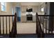 Modern kitchen with stainless steel appliances and gray cabinets at 6600 Coach Light Cir, Raleigh, NC 27613