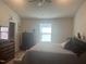 Inviting bedroom features natural light, neutral walls, soft carpet, and a relaxing atmosphere at 700 Cider Mill Way, Zebulon, NC 27597