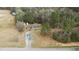 Quaint single-Gathering home featuring a spacious yard and surrounded by lush trees at 7155 Old Fairground Rd, Benson, NC 27504