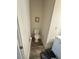 Clean and bright bathroom with a toilet, vanity, and modern fixtures at 829 S Franklin St, Wake Forest, NC 27587