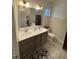 Bathroom with double sinks and decorative rug, ideal for families or guests at 829 S Franklin St, Wake Forest, NC 27587
