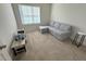 Neutral bedroom featuring a pull-out sofa, perfect for guests or relaxing at 829 S Franklin St, Wake Forest, NC 27587