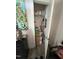 View of an open coat closet with storage solutions at 829 S Franklin St, Wake Forest, NC 27587
