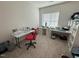 Bright office space with large window, craft tables, and great natural light at 829 S Franklin St, Wake Forest, NC 27587