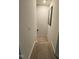 Carpeted staircase featuring decorative wall art at 829 S Franklin St, Wake Forest, NC 27587