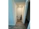 Hallway with stairs leading down to the basement at 829 S Franklin St, Wake Forest, NC 27587