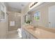 Bathroom with a shower, vanity, and ample natural light at 8429 Bells Lake Rd, Apex, NC 27539