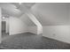 Upstairs bonus room featuring neutral walls, plush carpeting, and natural light at 8429 Bells Lake Rd, Apex, NC 27539