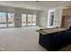 Spacious unfinished living room with large windows allowing natural light at 902 Norwood Ln, Apex, NC 27502