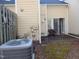 The backyard features a patio with a chair and an AC unit at 903 Teague Pl, Durham, NC 27707