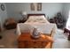 Spacious bedroom with bright natural light and vintage decor at 903 Teague Pl, Durham, NC 27707