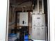 Modern Navien boiler and Carrier HVAC system for heating and cooling at 903 Teague Pl, Durham, NC 27707
