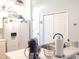 Spacious kitchen featuring white countertops, ample storage, and modern fixtures at 903 Teague Pl, Durham, NC 27707