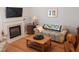 Comfortable living room with a fireplace, TV, and relaxed atmosphere at 903 Teague Pl, Durham, NC 27707