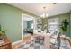 Bright dining room with views into the living room; features stylish decor and ample natural light at 914 S Crescent Dr, Smithfield, NC 27577