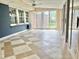 Spacious sunroom with tile floors, abundant natural light and exterior access at 914 S Crescent Dr, Smithfield, NC 27577