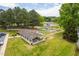 Aerial view of a community park with a covered picnic area, walking paths, and a playground at 101 Listokin Ct, Cary, NC 27519
