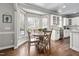 Cozy breakfast nook with natural light, a round table, and kitchen access at 101 Listokin Ct, Cary, NC 27519