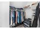Walk-in closet with clothing rack and shelving for organization at 101 Listokin Ct, Cary, NC 27519