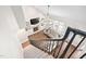 Open living room with fireplace and vaulted ceilings, viewed from the top of the staircase at 101 Listokin Ct, Cary, NC 27519