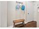 Mudroom with coat hooks, bench, and door to the outside, perfect for organization at 101 Listokin Ct, Cary, NC 27519