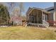Screened-in porch and deck offering a relaxing outdoor living space with views of the backyard at 101 Listokin Ct, Cary, NC 27519