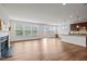 Open living room area with lots of natural light and hardwood flooring at 105 Concordia Woods Dr, Morrisville, NC 27560