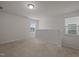 Bright loft space featuring neutral carpet, white walls, natural light, and a half wall at 105 Concordia Woods Dr, Morrisville, NC 27560