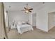 Bedroom with carpet, ceiling fan, and natural light at 10707 Edmundson Ave, Raleigh, NC 27614