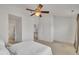 Bedroom with ceiling fan and access to the bathroom at 10707 Edmundson Ave, Raleigh, NC 27614