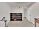 Multi-purpose room featuring a bookshelf and exercise equipment at 10707 Edmundson Ave, Raleigh, NC 27614