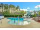 Community kiddie pool with water features and a large water slide at 10707 Edmundson Ave, Raleigh, NC 27614