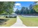 Community tennis courts with shaded shelter, perfect for an active lifestyle at 10707 Edmundson Ave, Raleigh, NC 27614