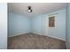 Cozy bedroom with carpet flooring, a window and neutral paint at 109 Killam Ct # La, Cary, NC 27513