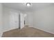 Bedroom features neutral walls and plush carpet, along with a closet at 1103 Apogee Dr, Durham, NC 27713