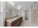 Spacious bathroom with double sinks, granite counters, and walk-in glass shower at 1103 Apogee Dr, Durham, NC 27713