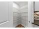 Walk-in pantry offers ample storage space with wire shelving and easy access at 1103 Apogee Dr, Durham, NC 27713